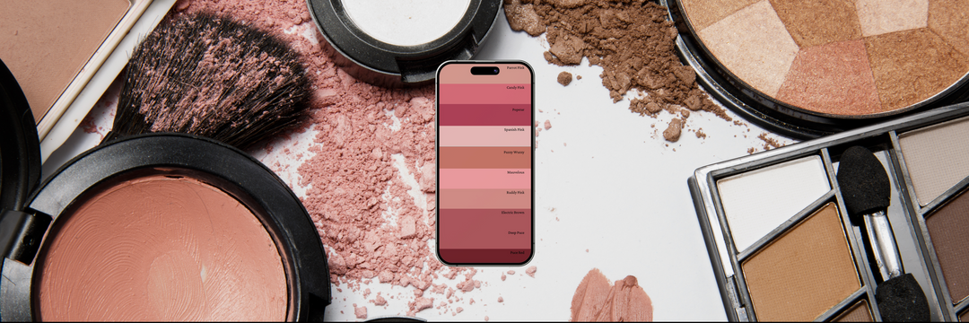 Makeup palette displayed on a phone, with makeup products in the background