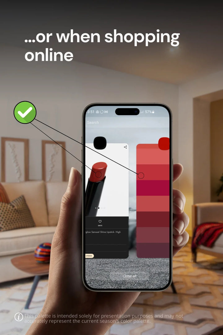Hand holding phone in a living room, demonstrating how to use the color palette for online shopping, comparing lipstick color with palette.